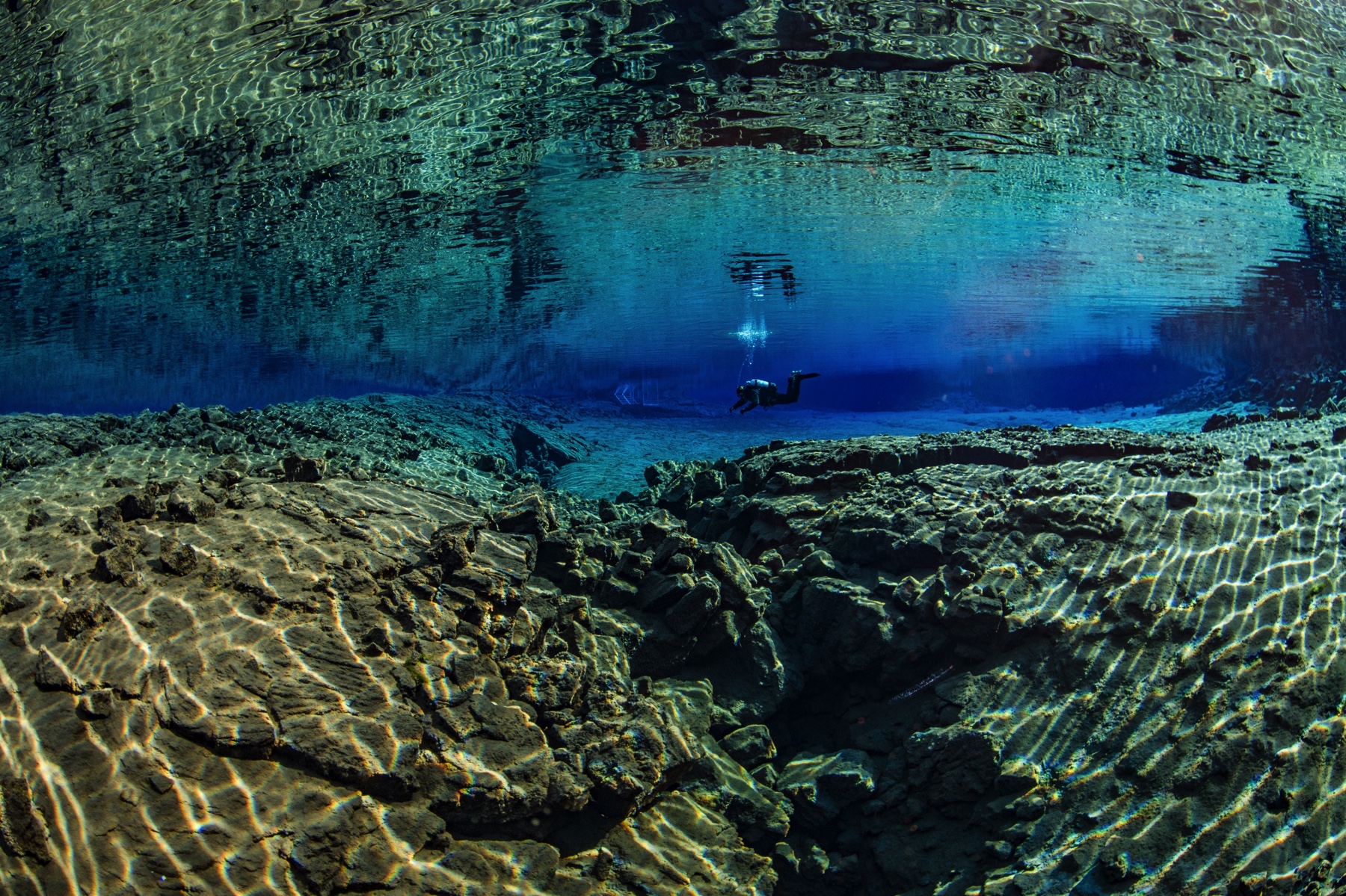diving-silfra-under-the-midnight-sun-iceland-with-dive.is.jpg
