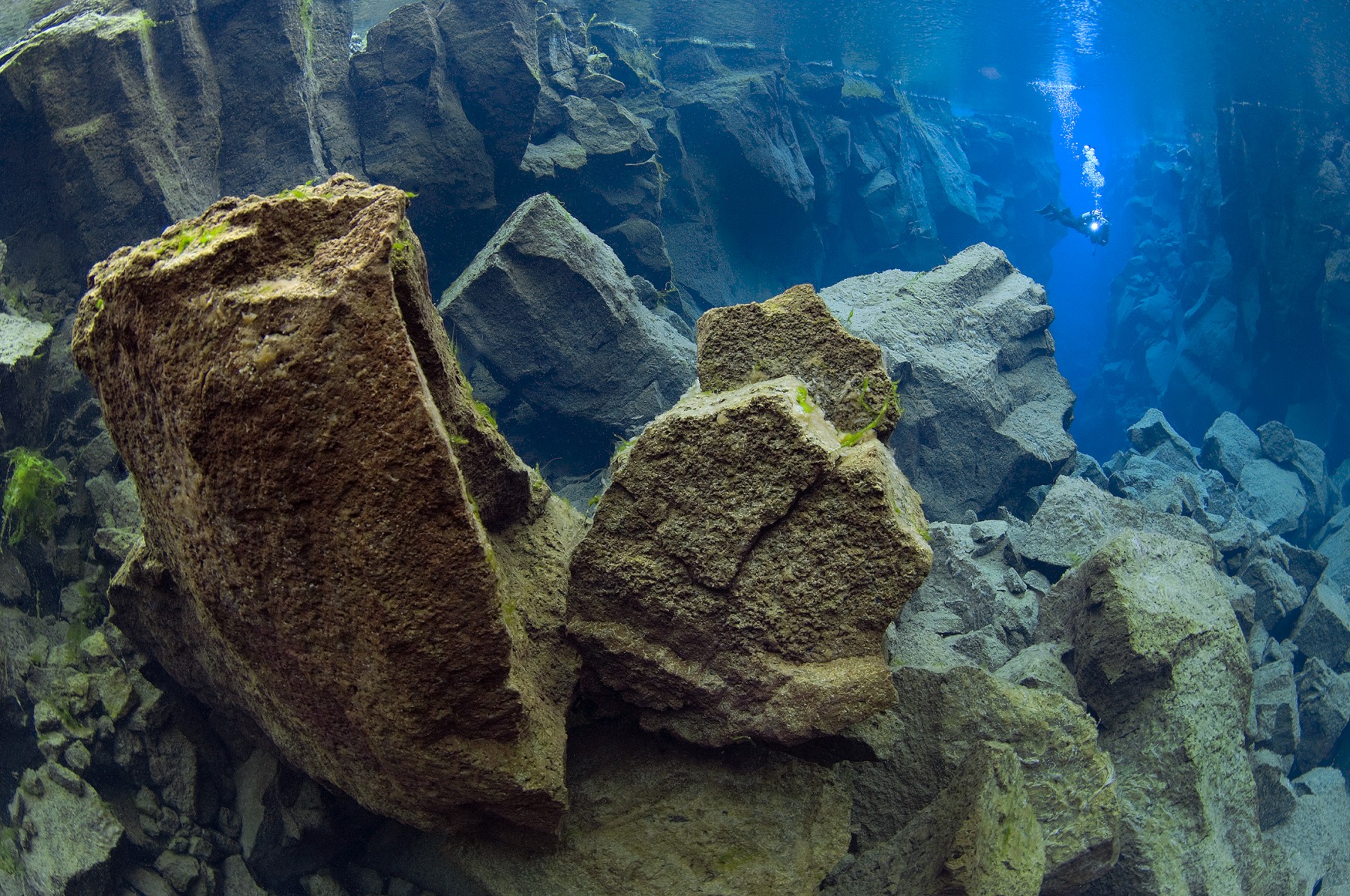 Diver coming out of the Cathedral in Silfra, Thingvellir