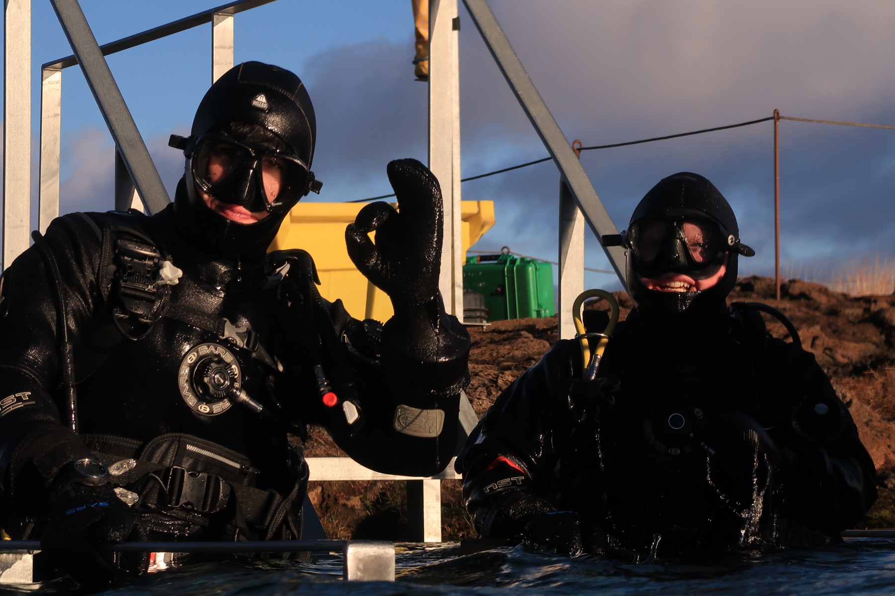 Sigga Vala with her Snorkeler at the exit platform at Silfra sigga-vala-at-exit-platform-silfra-with-snorkeler