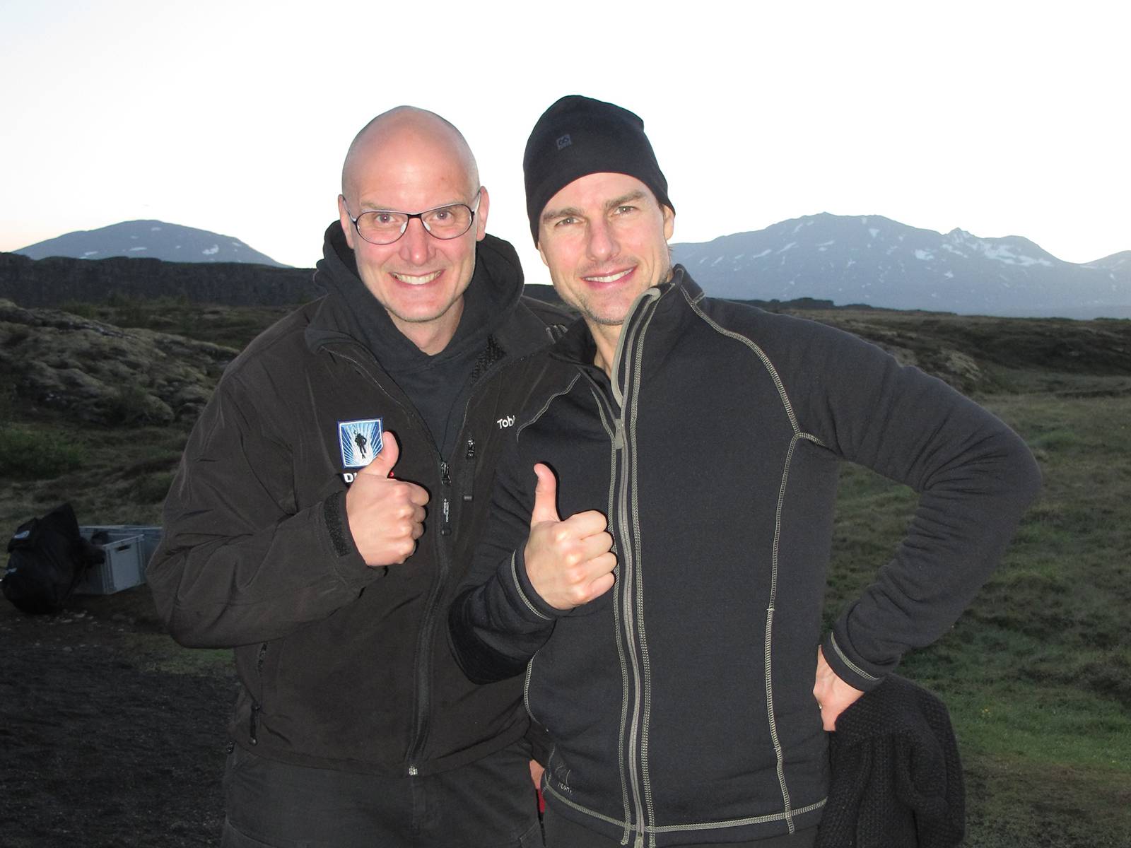 Tom Cruise & Tobias Klose giving thumbs up after scuba diving in Silfra Iceland