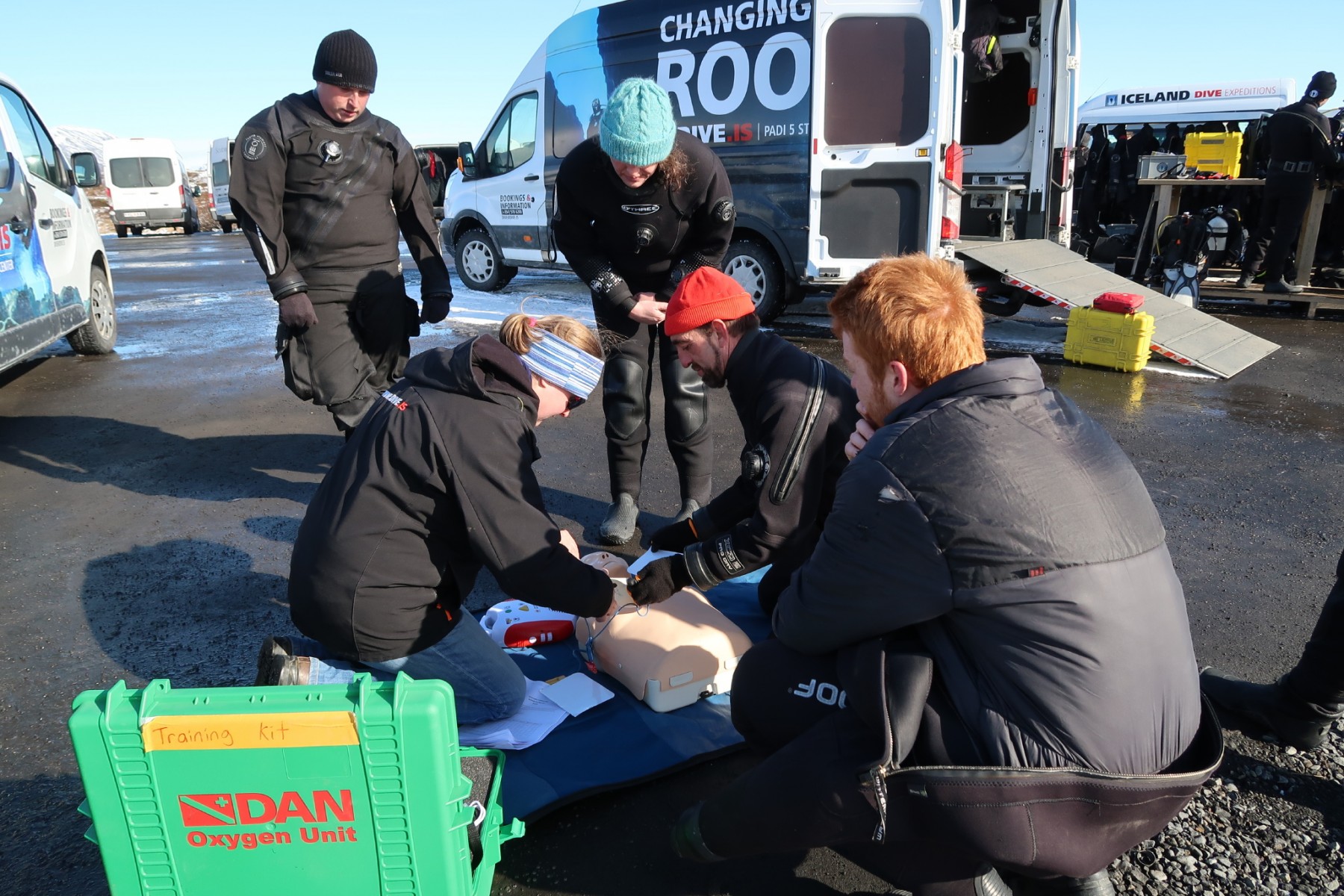 dive-and-snorkel-guides-practicing-first-aid-at-silfra-safety-workshop-dive-is