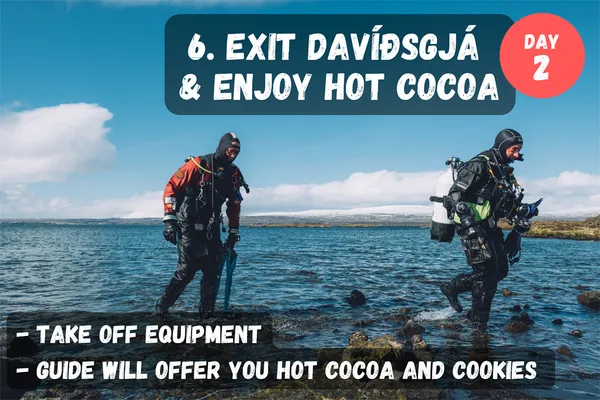 Exit the Davíðsgjá fissure and take off your equipment. Enjoy hot cocoa to warm up after the dive.