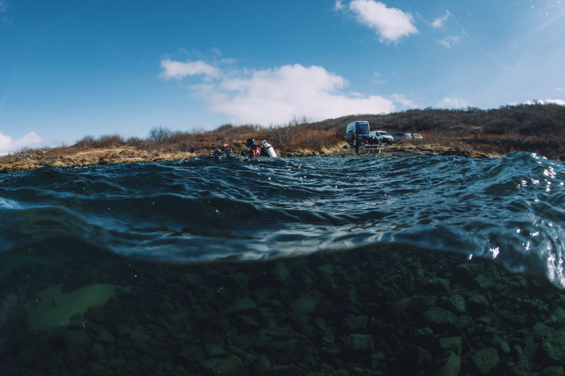 splitshot-davidsgja-shore-with-diver-by-anders-nyberg
