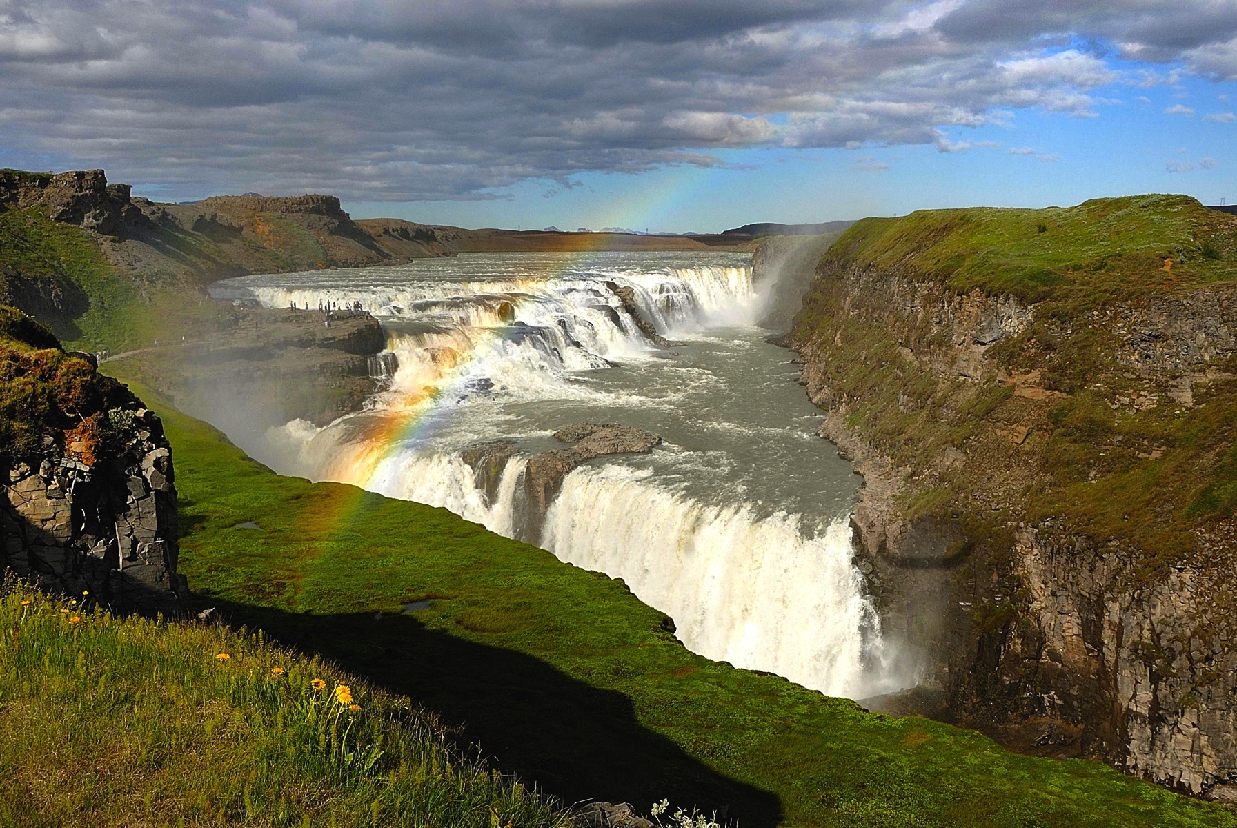 The golden waterfall "Gullfoss" and a rainbow