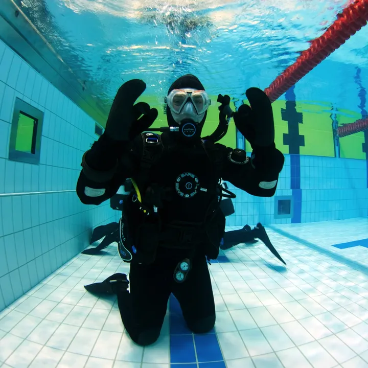 Dry suit course student learning dry suit diving in Iceland