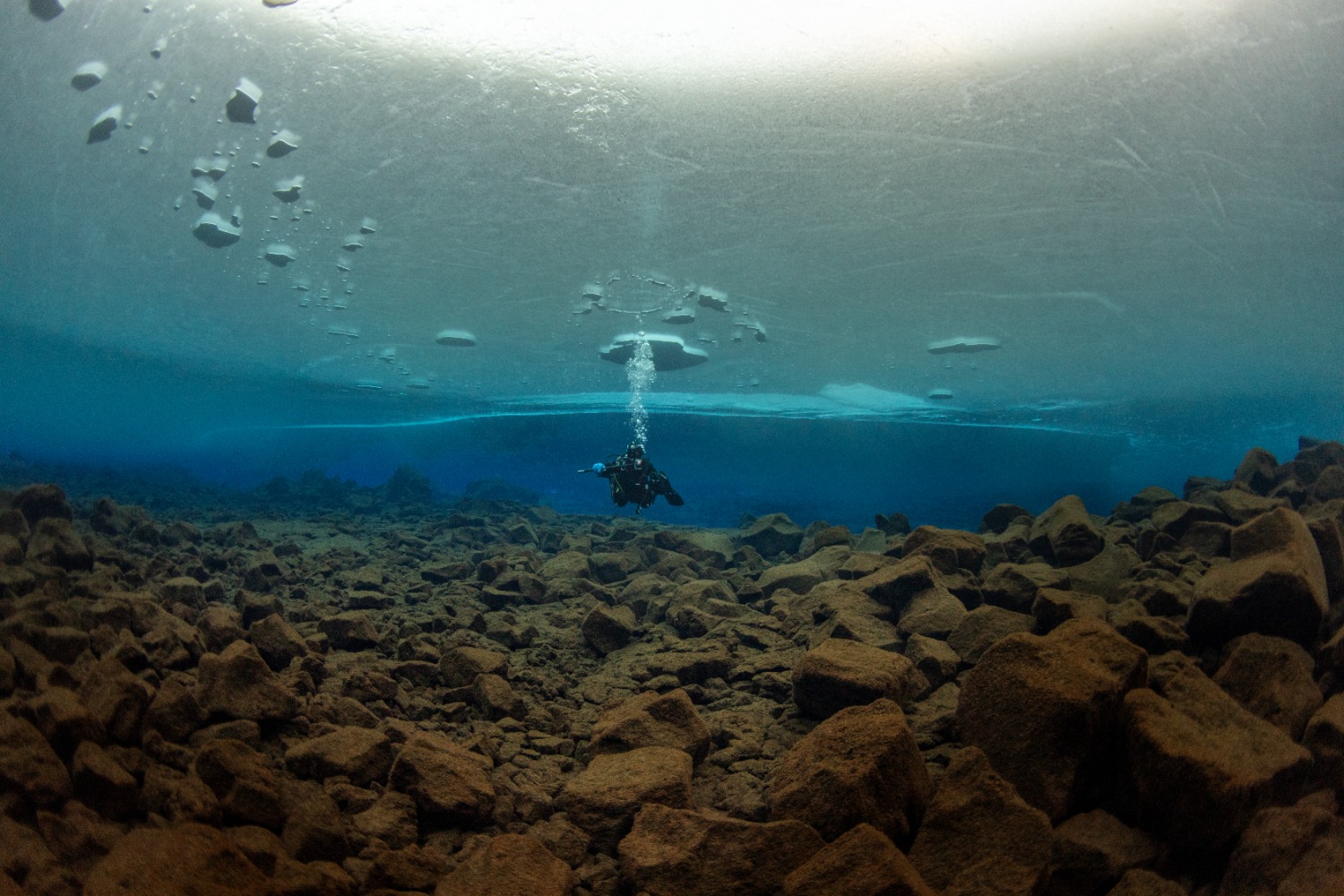 a-diver-in-davidsgja-fissure-in-thingvellir-national-park-iceland.jpg