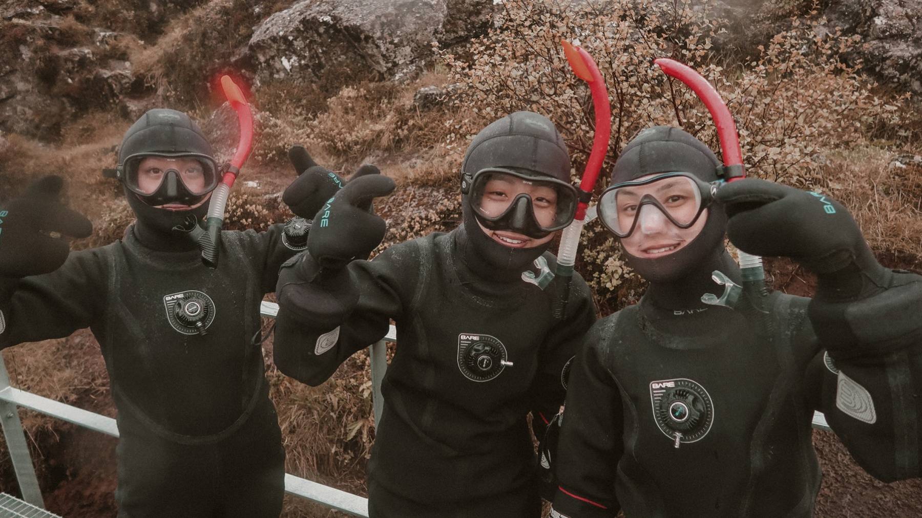Excited snorkelers ready for Silfra excited-snorkelers-ready-to-enter-silfra-carson