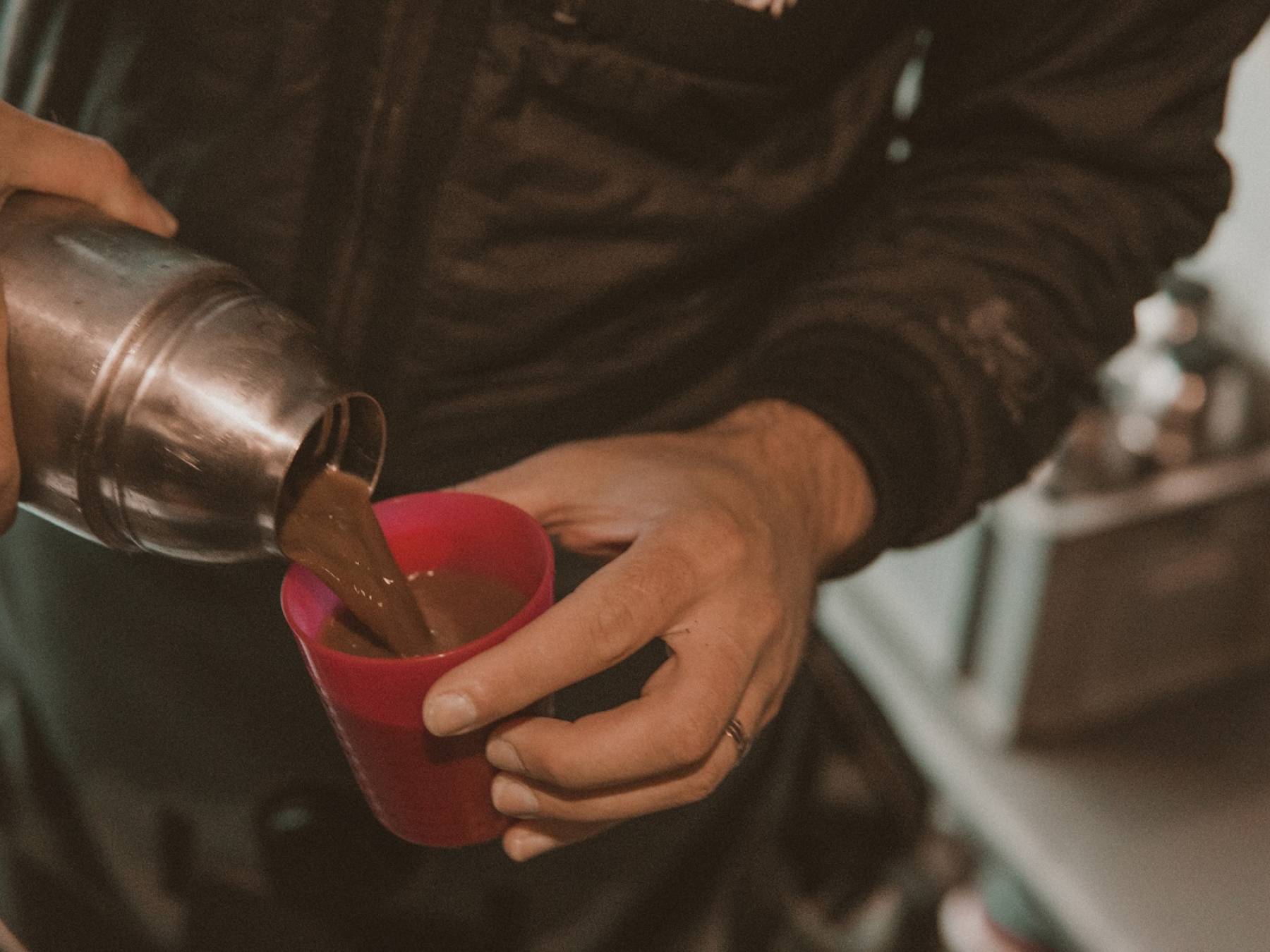 Deyan pouring his snorkelers a hot chocolate after the tour deyan-pouring-snorkelers-hot-chocolate