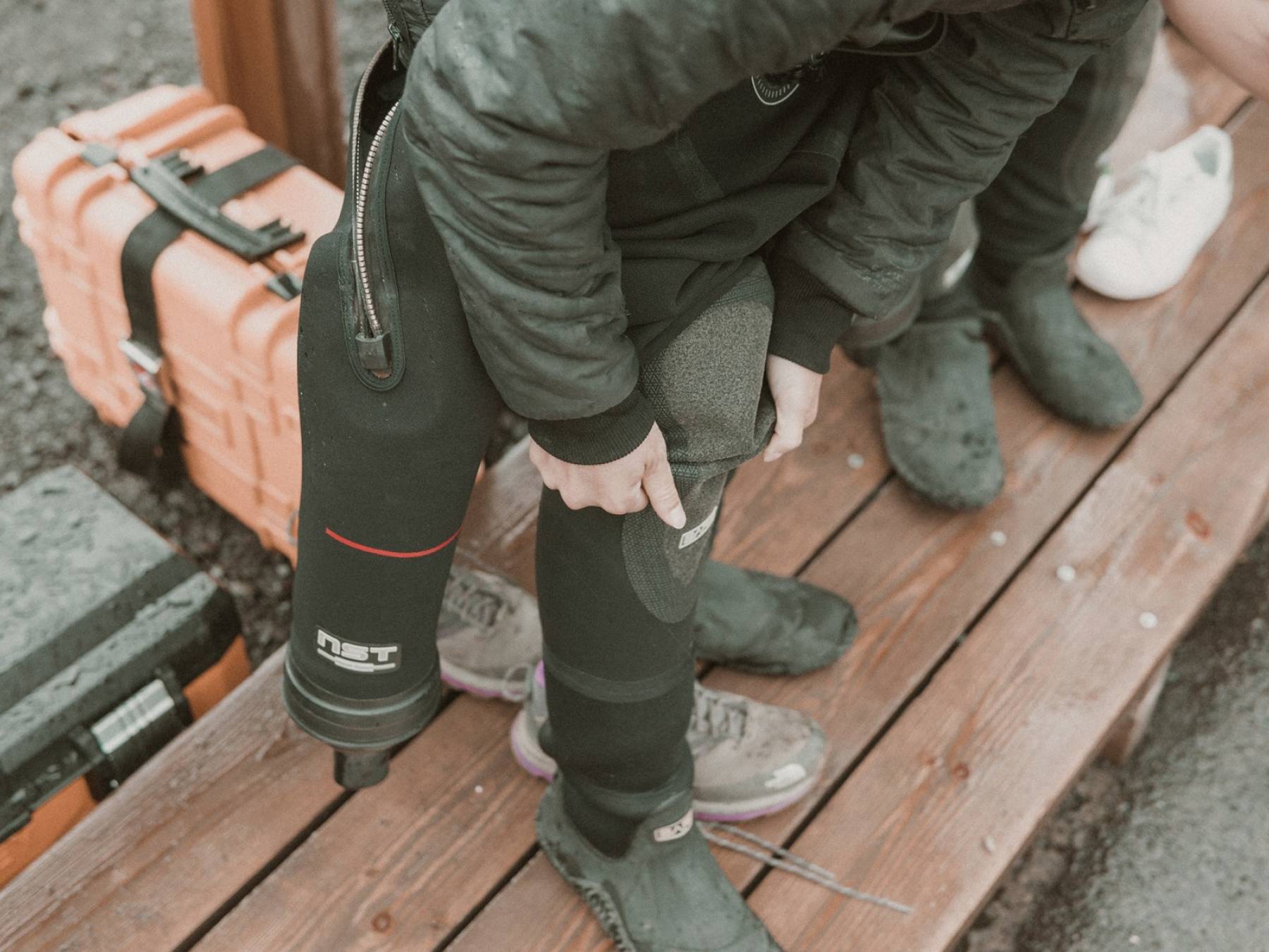 Putting on the Dry Suit Boot putting-on-dry-suit-boo