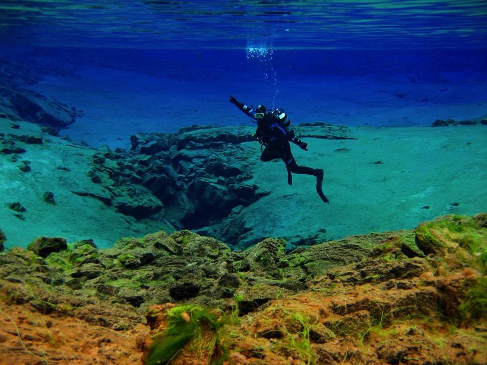 Diver having fun on an Open Water Course diver-having-fun-open-water-course-dive-is