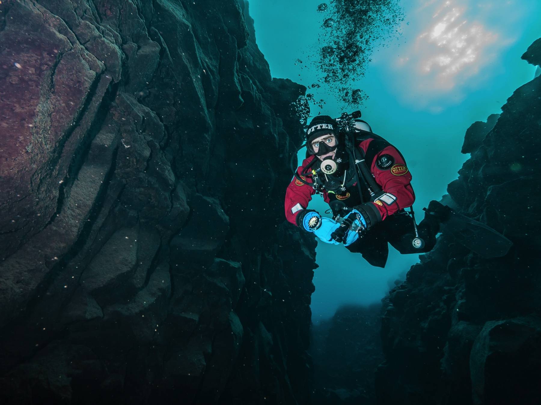 Dry suit diver in Davíðsgjá with DIVE.IS dry-suit-diver-in-davidsgja-iceland-dive-is