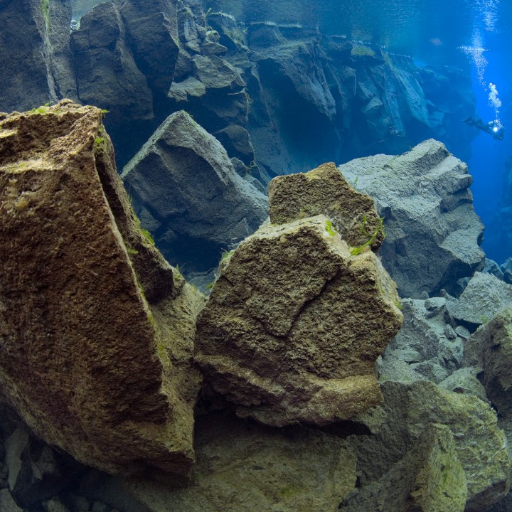 diver-coming-out-of-the-cathedral-in-silfra-thingvellir-iceland-magnus-lundgren-720x720.jpg