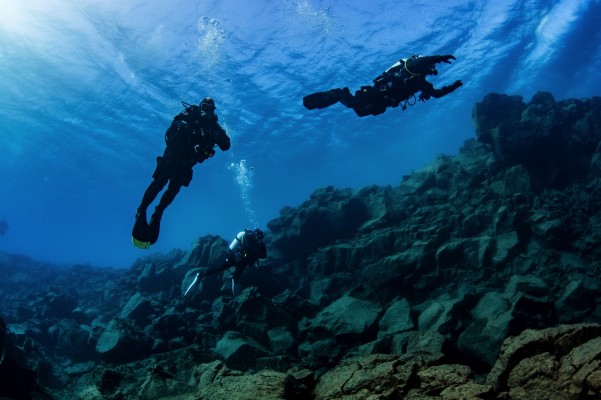 Dry suit diving in Davidsgja fissure