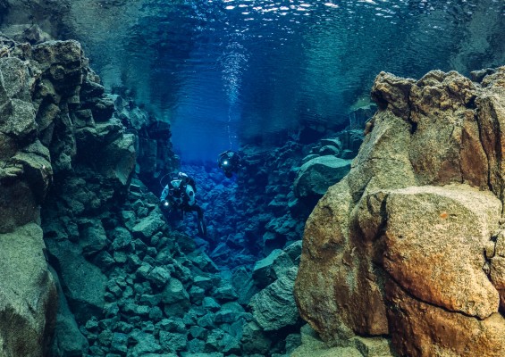 Scuba diving in Davidsgja fissure in Thingvellir, Iceland