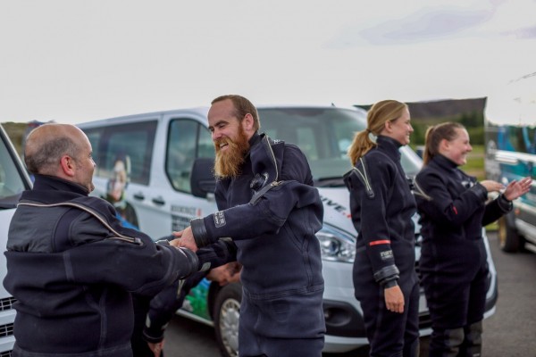 Putting on a dry suit at the DIVE.IS meeting point in Thingvellir national park