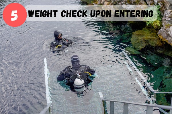Your guide will check your weights upon entering the Silfra fissure.