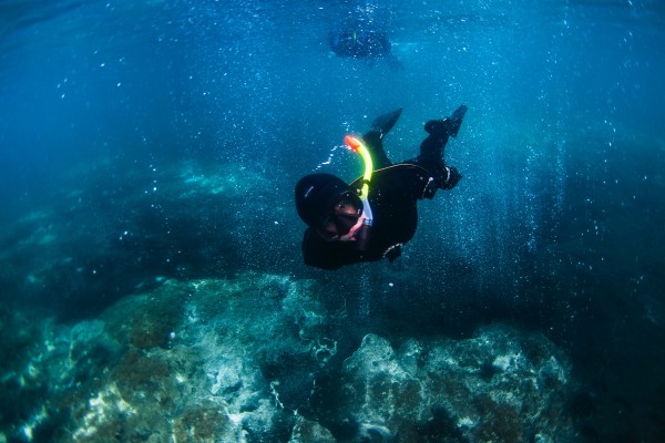 Snorkeling in bubbles like a glass of champagne in Iceland