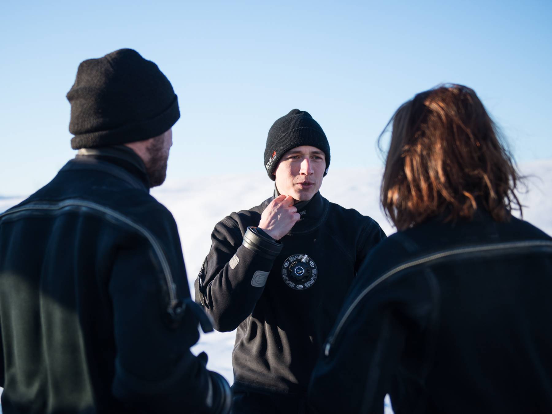 Snorkel guide briefing snorkeling customers at Silfra Snorkel guide briefing snorkeling customers at Silfrasnorkel-guide-briefing-snorkeling-customers-silfra-dive-is