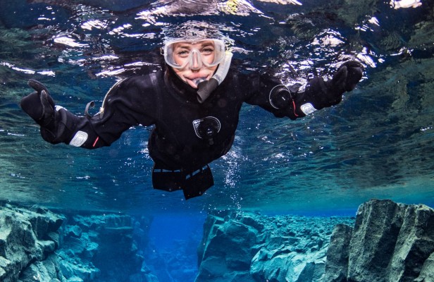 Snorkeling between the continents at Silfra fissure in Iceland