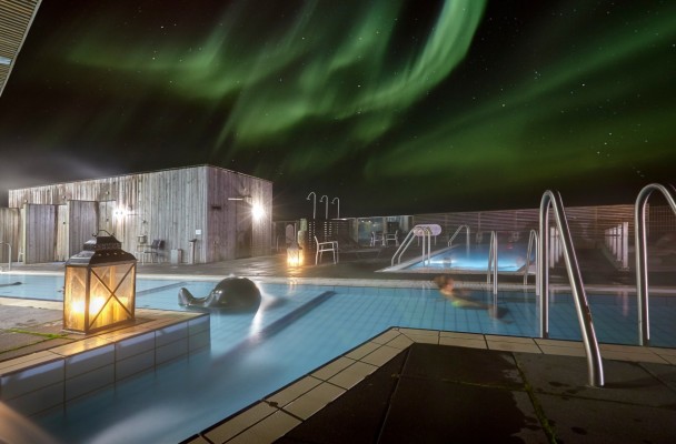 The Laugarvatn Fontana spa under the amazing Northern lights in Iceland
