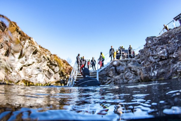 Snorkelers waiting on platform to enter Silfra fissure